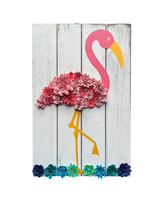 white board with a flamingo made out of paper flowers